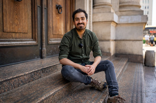 Pedro Fierro sat on steps