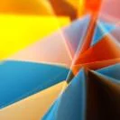 Abstract artwork with overlapping tri-polygonal shapes in orange, yellow, blue, and red, in a layered composition