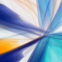 Abstract image of blue, teal, white, and yellow streaks radiating into a motion-blur effect.