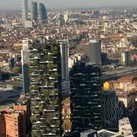 Aerial view of Milan showcasing the iconic Bosco Verticale with cityscape backdrop.