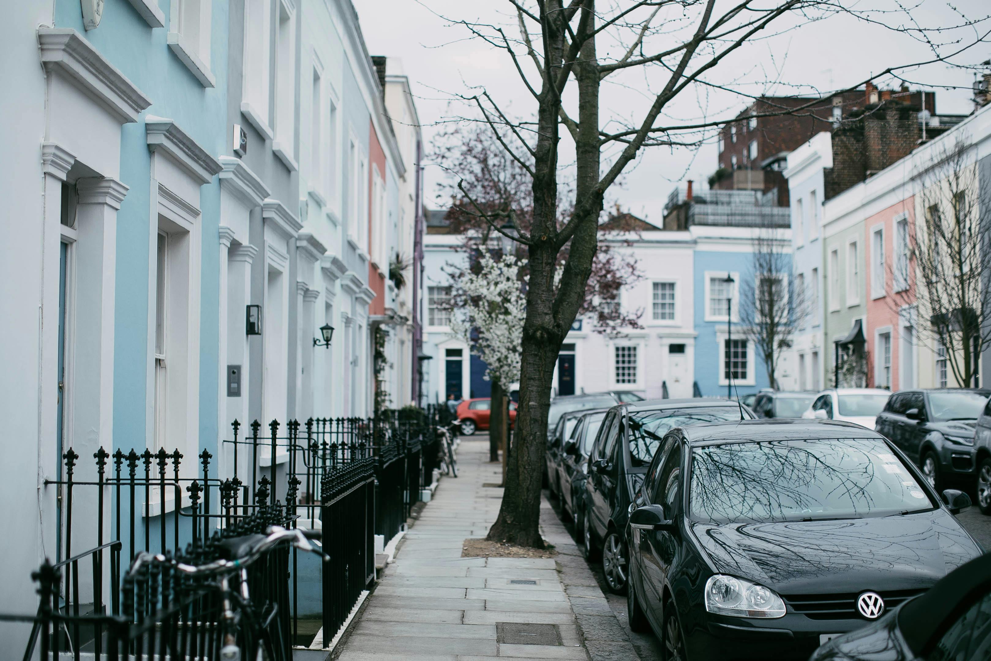 London street with houses and cars parked 