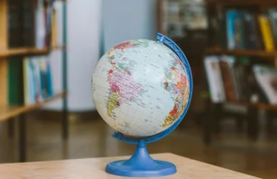 Globe on table in library