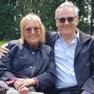 Phoebe and Tony Hall sit on a bench in Lincoln Inn Fields