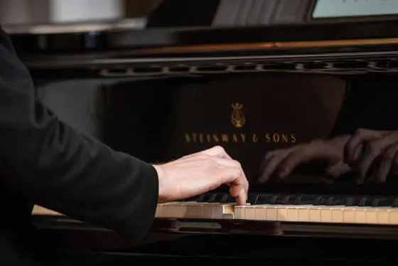 Pianist performing at a lunchtime concert