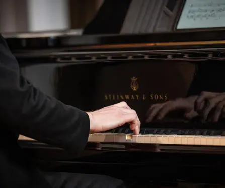 Pianist performing at a lunchtime concert