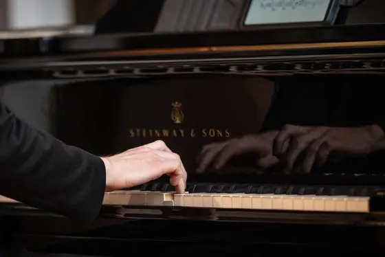Pianist performing at a lunchtime concert