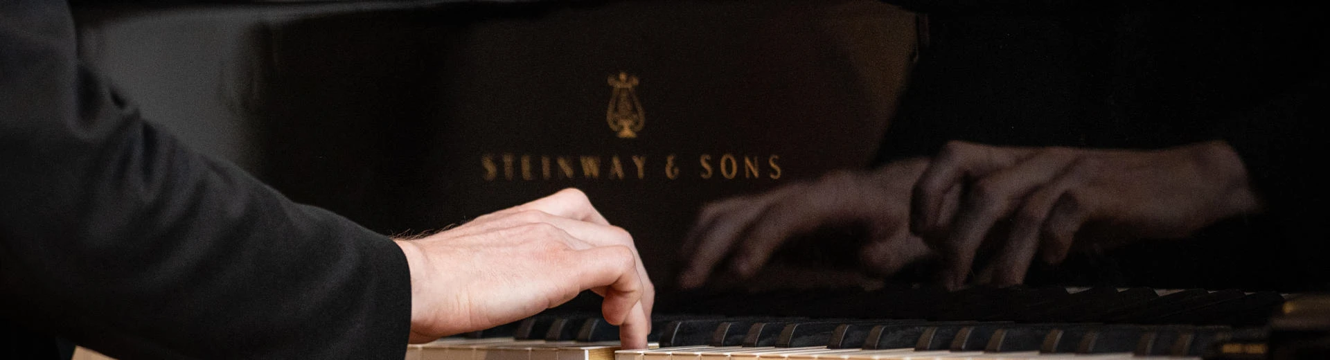 Pianist performing at a lunchtime concert