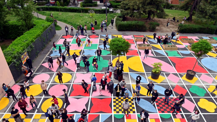 People on a colourful tiled floor in Milan
