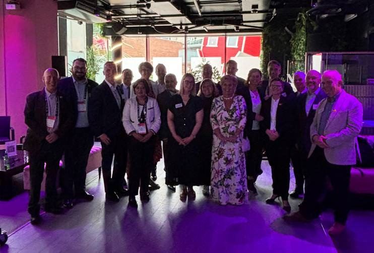 A picture of the attendees at the event