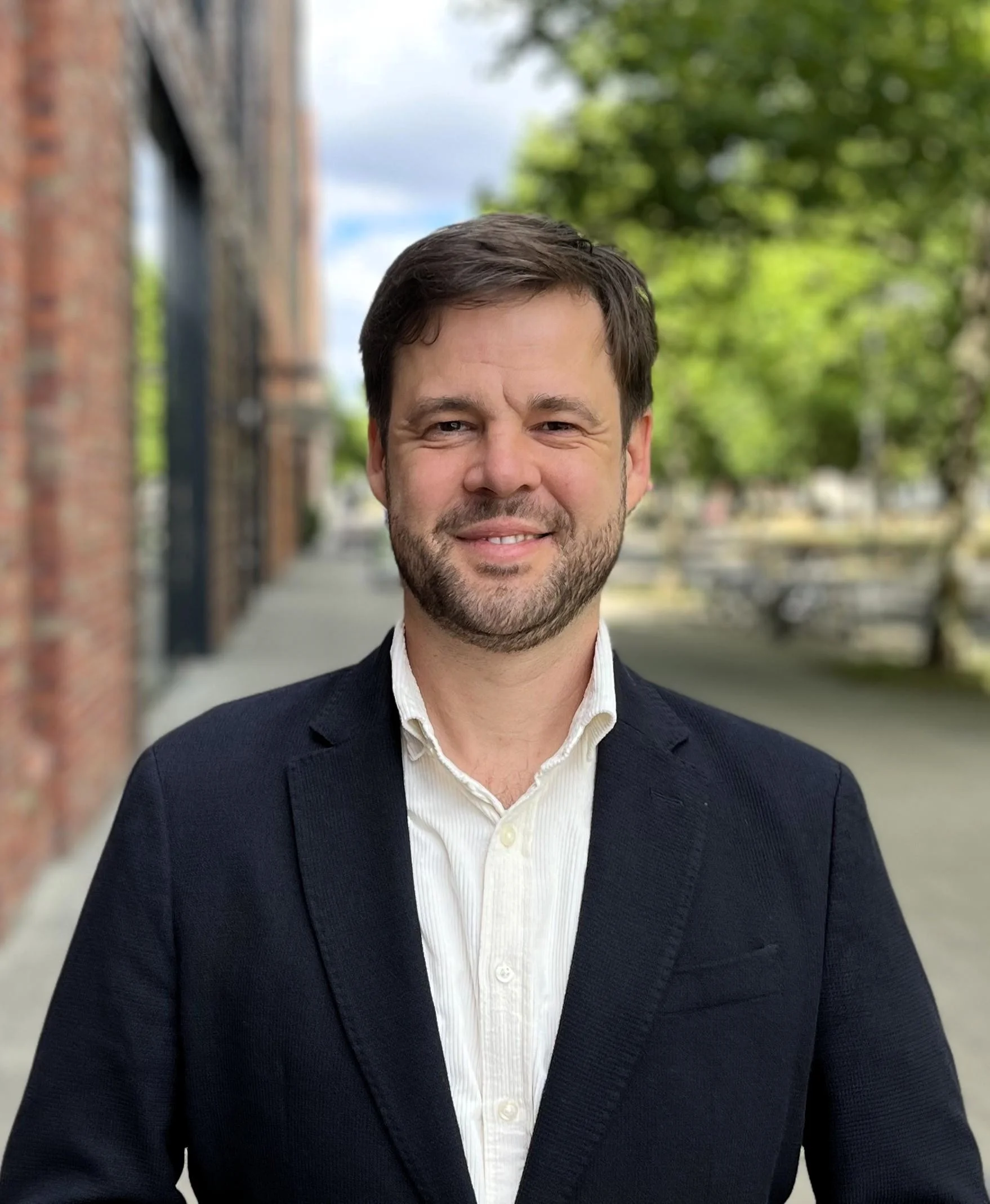 Headshot of Professor Christian Kroll