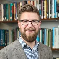 Headshot of Dr Florian Ostmann