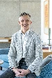 Headhshot of Kieron Boyle in a blazer and shirt