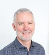 Headshot of Patrick McGovern smiling.
