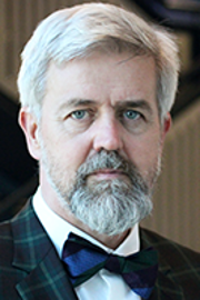 Portrait photo of Paul Kelly