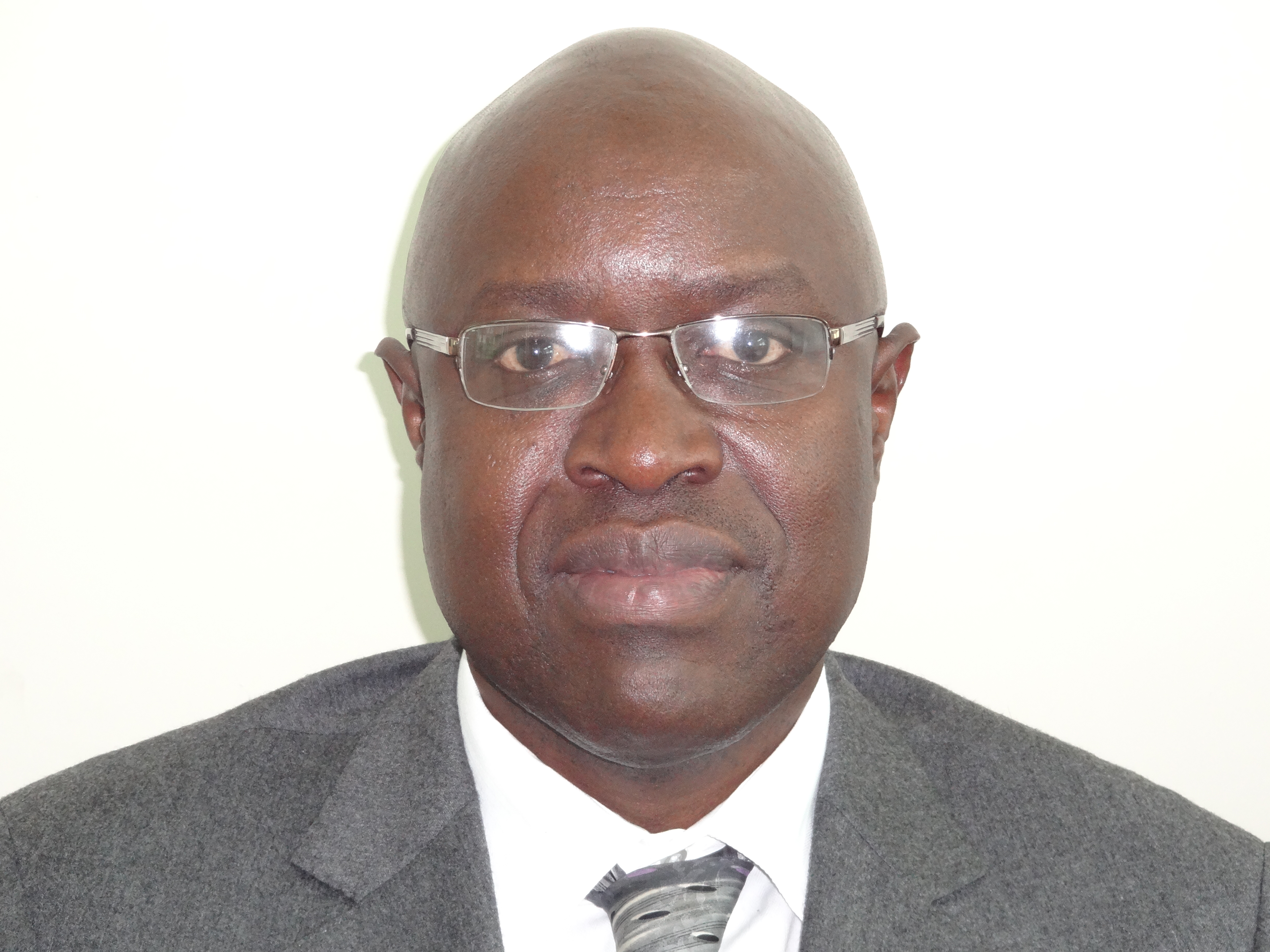 Wafula Okumu Headshot