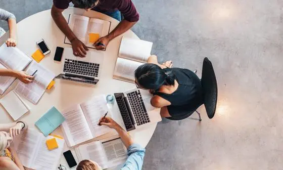 Global_Programmes_Stock_topview_students_around_table-cropped