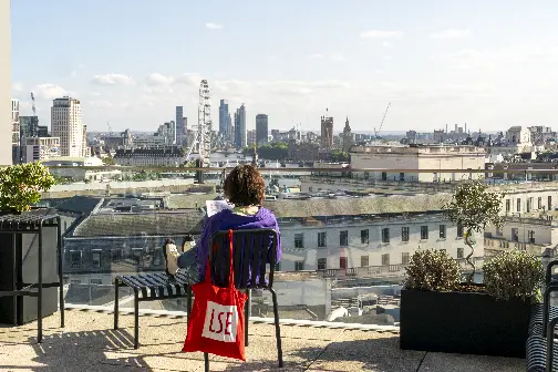 student reading on LSE rooftop