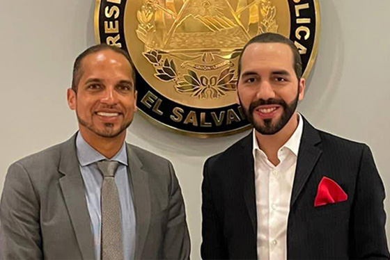 Rafael Mendoza stands beside the President of El Salvador