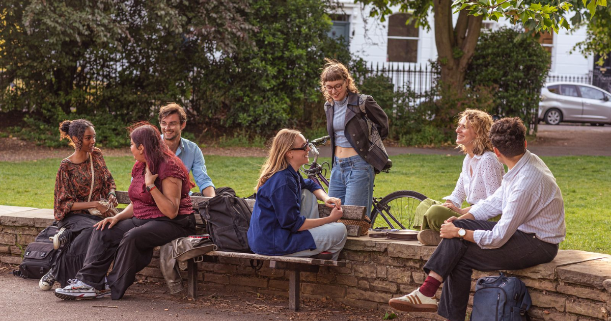Young people laughing in a park