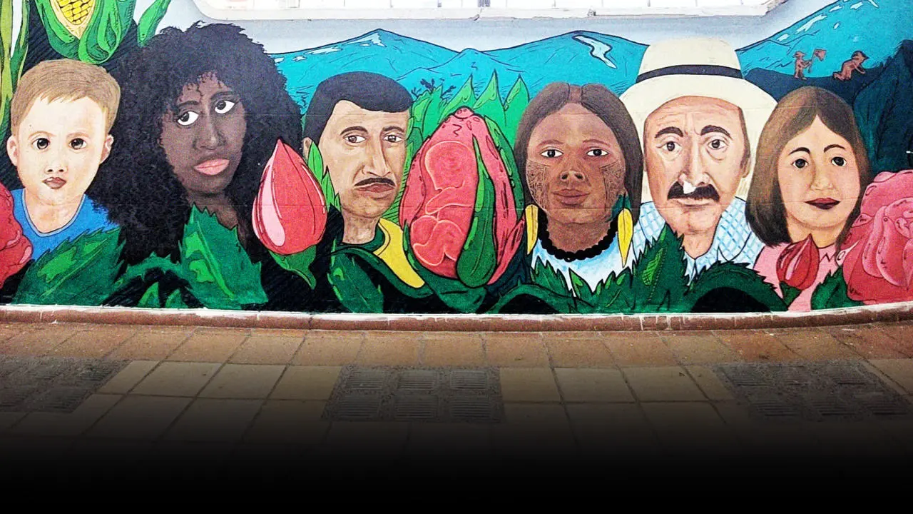 Mural from the office of COMUNES, political party of the former FARC guerrillas, in Medellin by George Kunnath