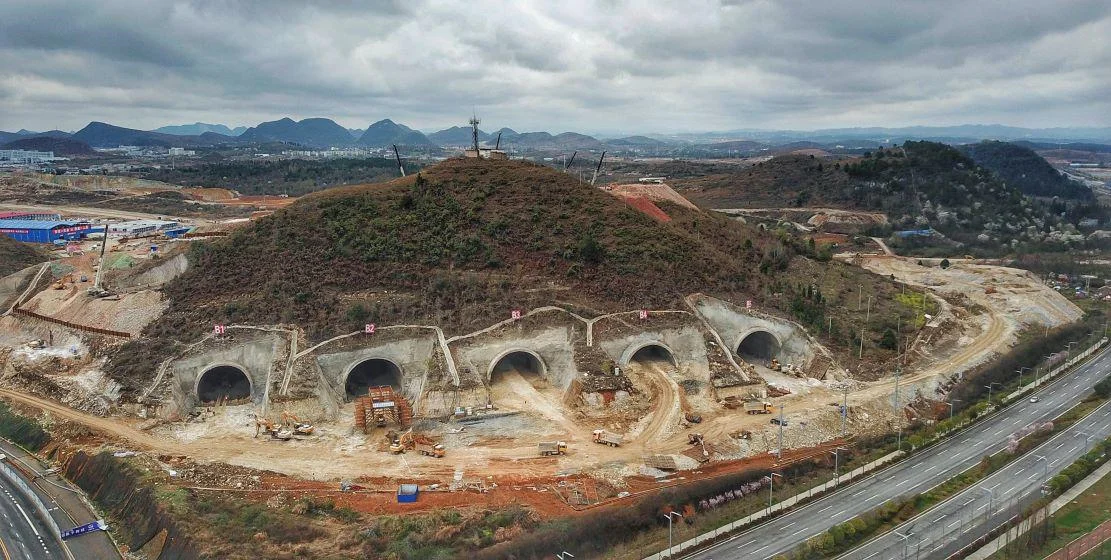 Five tunnels into a mountain under construction