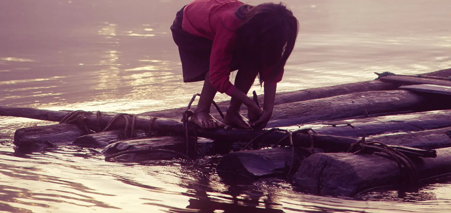 A Urarina girl on a raft