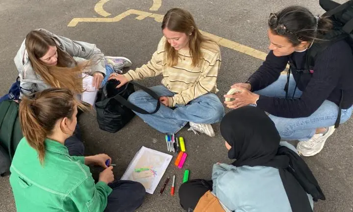 Researchers-in-residence reflecting on and mapping the area around a carpark and retail centre in Trowbridge.