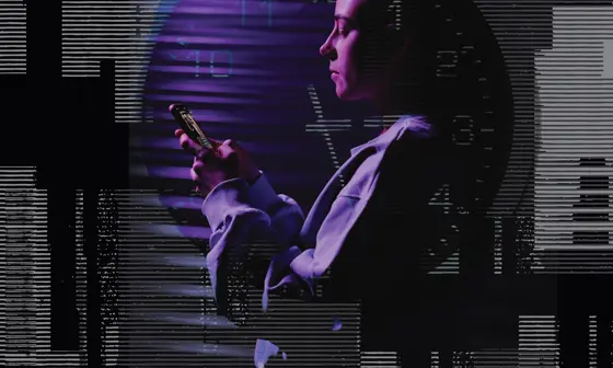 A woman holding a smartphone