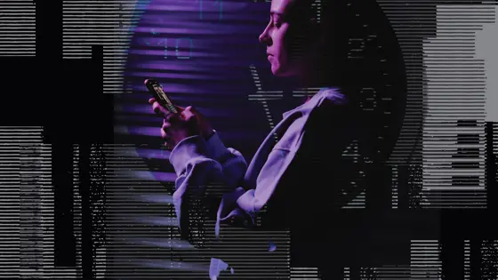 A woman holding a smartphone