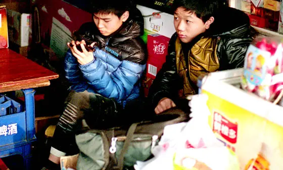 children using a smartphone