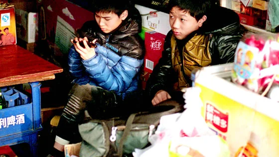 children using a smartphone
