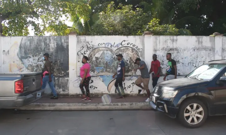 Haitians on their way to an appointment at the Mexican Commission for Refugee Assistance