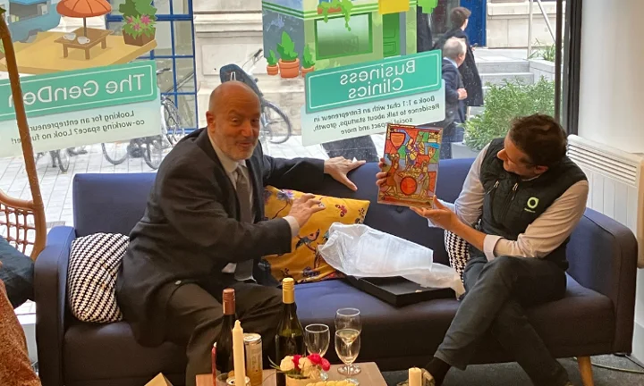 Rishi Khosla holding Fabian Window as Larry talks to him