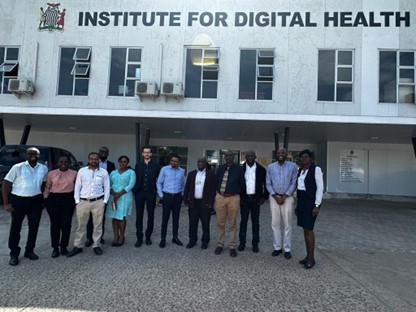 Researchers standing outside the Institute for Digital Health building