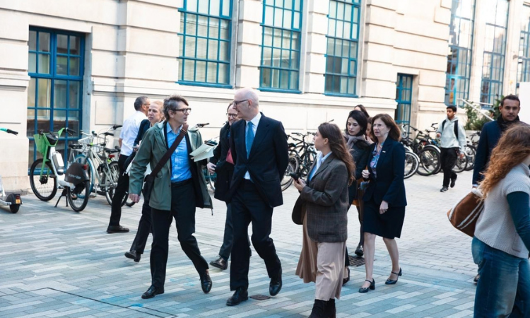 French Finance Minister Roland Lescure walking on LSE campus