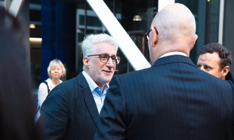 Professor Ronny Razin talking to Minister Roland Lescure