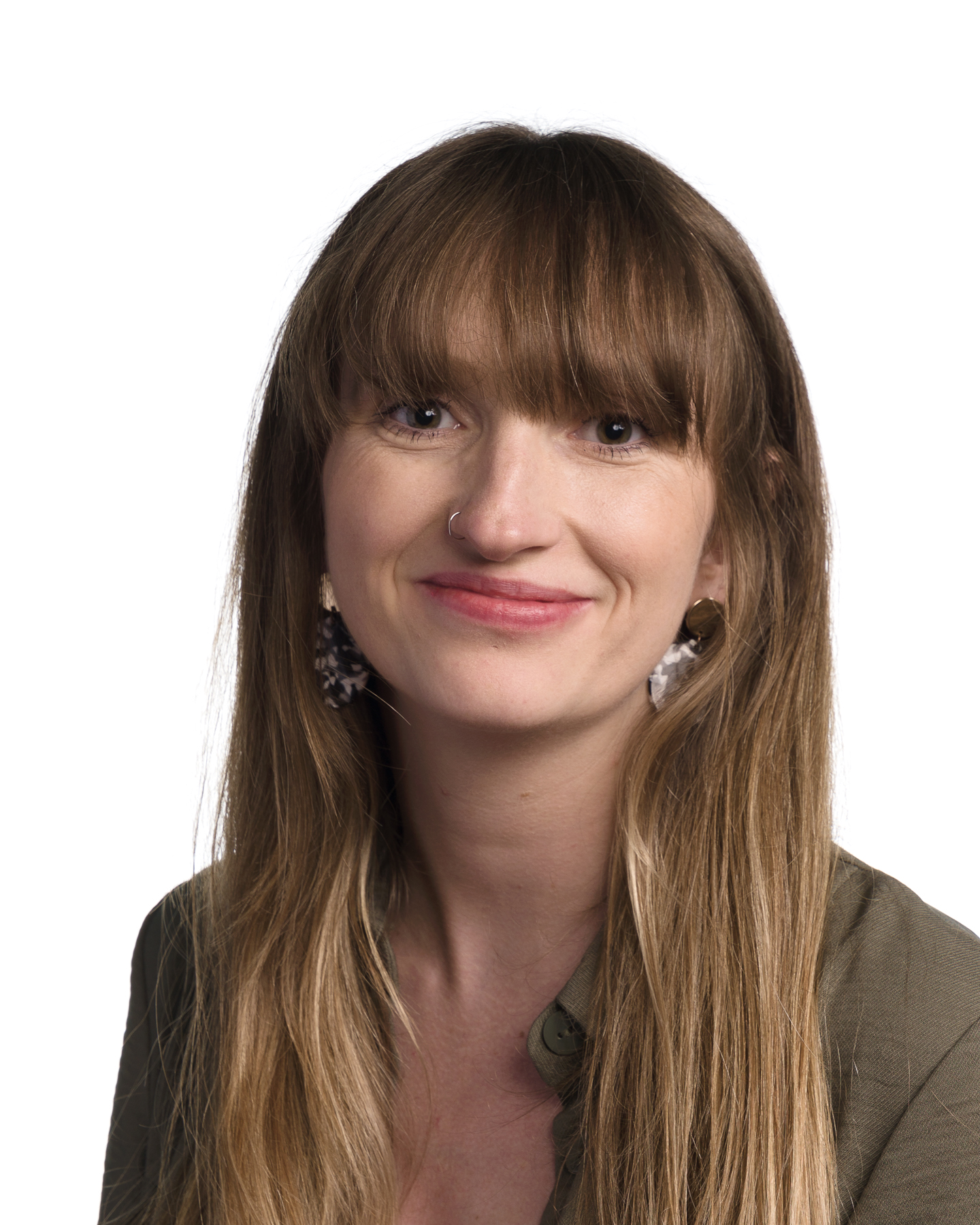 Headshot of woman with long brunette hair