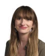 Headshot of woman with long brunette hair