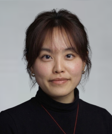 Tianyi Wu in front of grey 