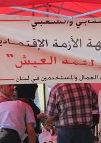 Tent and banner at a protest in Lebanon.