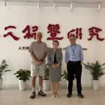 Qingfei Yin and faculty in China