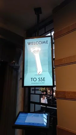 A digital sign welcoming visitors to SSE.