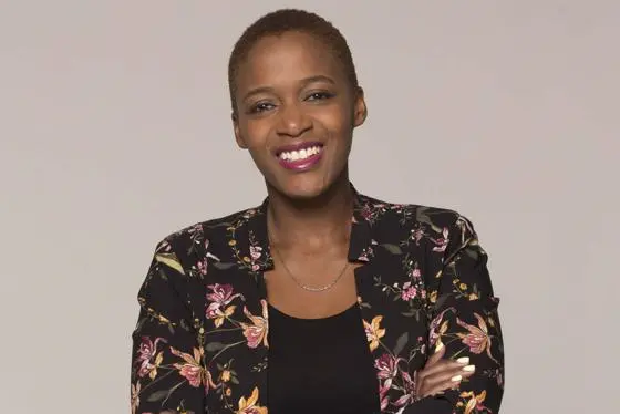 PhD student smiling at camera