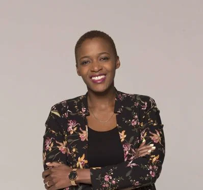 PhD student smiling at camera