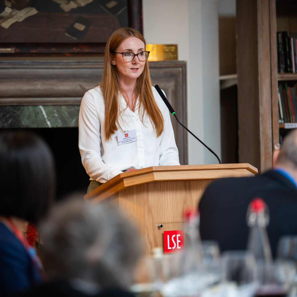 Sian Pierce standing at podium