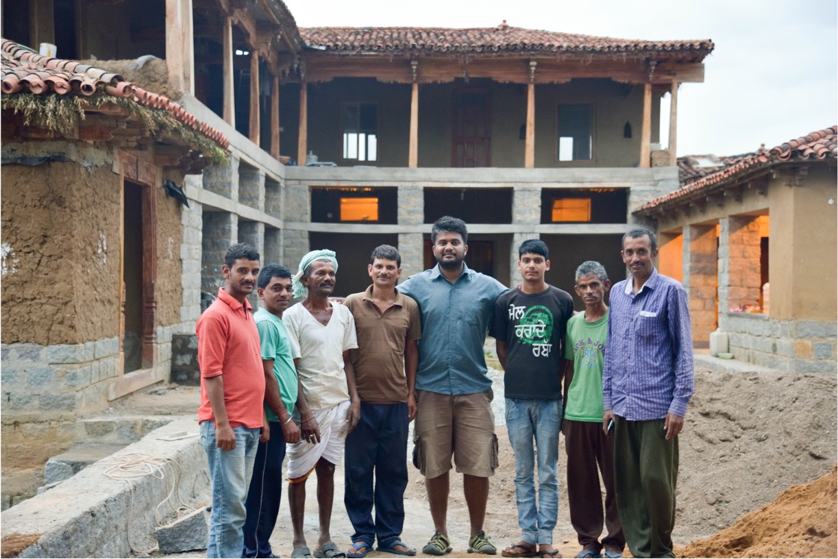 Siddharth Menon on an earth building construction site in India.