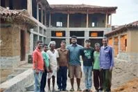 Siddharth Menon on an earth building construction site in India.