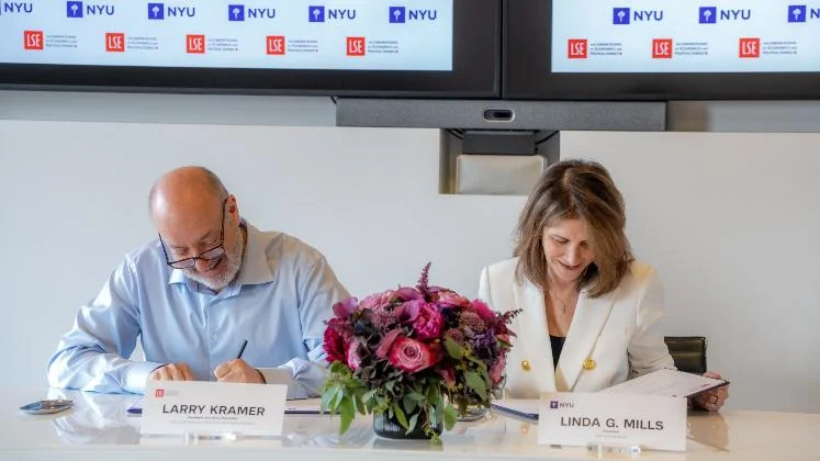 Larry Kramer and Linda G. Mills signing newly established LSE-NYU double degree.