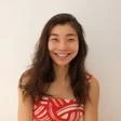 Headshot of a smiling woman against a white background