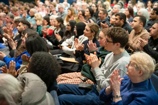 Audience in Old Theatre Clapping